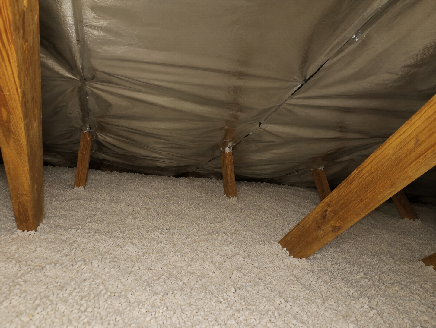 Even blown-in fiberglass coverage in DeLand Florida attic